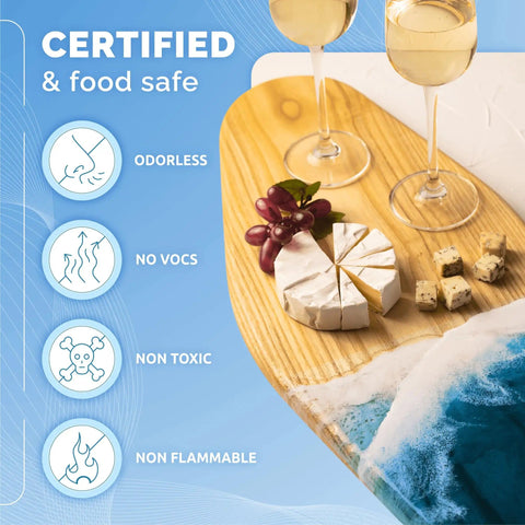 Crystal Clear 64 Oz Epoxy Resin Kit With Hardener For Food Safe DIY Art Woodworking Jewelry Making Coasters Mold Casting Low Viscosity Self Leveling Perfect For Beginners And Pros displayed on a food-safe wooden board with cheese and wine.
