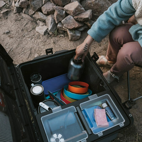 Open Trail 80 Waterproof Storage Box With Wheels, 79L Outdoor Gear Case showing interior organized with camping accessories