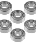 Slick Spindle Bearings Repair Kit Compatible With John Deere Bobcat Snapper Troy Bilt Lawn Tractors with six metal bearings.