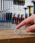 M6 40 Pack Premium 304 Stainless Steel Conical Spring Washers With Single Side Knurl Grip on workbench with tools