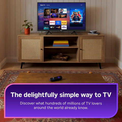 Sleek 32 Inch Full H d Smart Television Packing Hella Crisp Picture Quality And Dead Smooth Streaming Tailored For Chill Bedrooms And Bustling Kitchens on a wooden TV stand with decor.