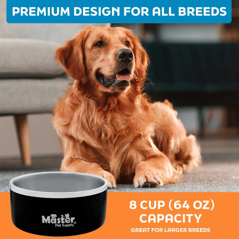 Game Changer Rock Solid Extra Thick Stainless Steel Dog Bowl 64 Oz Large heavy duty pet dish with dog resting nearby.