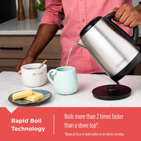 1.7L Cordless Electric Kettle With Rapid Boil Technology And Auto Shutoff, Stainless Steel Water Heater pouring into cup