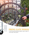 Heavy Duty Steel Spring Loaded Gate Caster With Rock Solid Hidden Spring Design For Buttery Smooth Swiveling Fence Gate Operation And No Hassle Auto Leveling On Rough Terrains, showing installation on an ornate gate.