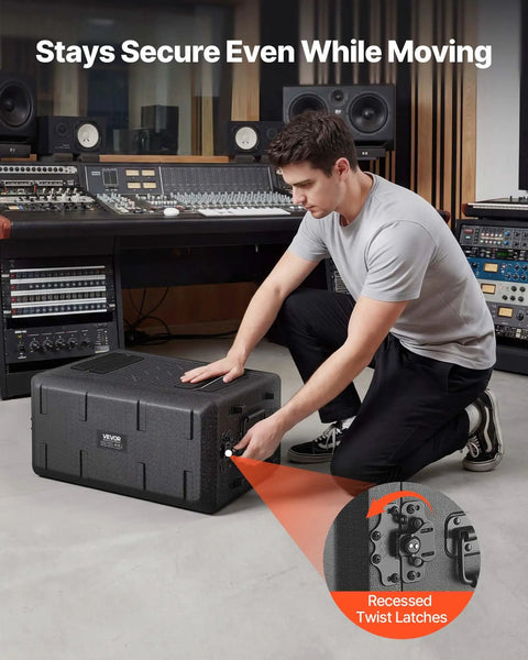 Man securing Kickass 4U Rack Mount Case Shallow Flight Box with recessed slide latches in studio setting.