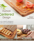 Top Shelf Deep Carbonized Bamboo Cutting Board with deeper juice grooves, showcasing human-centered design for convenience.