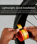 Installing Two Pack Bike Tire Liners With 1.3mm TPU Puncture Protection into a bicycle tire, adhesive surface shown.