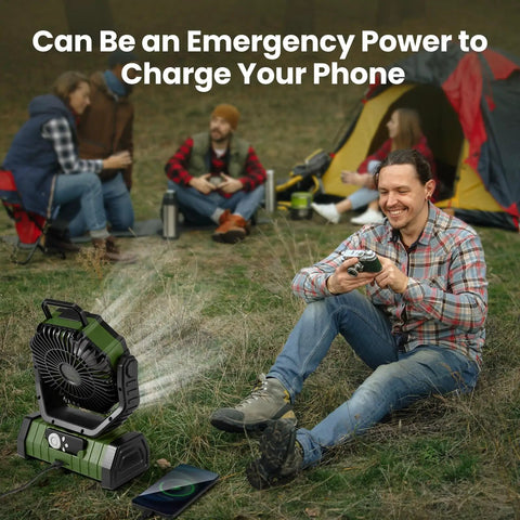 Camping Fan With LED Lantern And 30000mAh Battery used outdoors, person charging phone, tent in background, portable for camping trips
