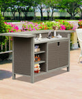 Outdoor Patio Bar Table With Aluminum Frame And PE Wicker Bar Cart Cabinet All Weather Storage in garden setting