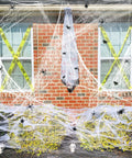 Premium Super Stretchy Halloween Spider Webs Covering 1400 Square Feet With 150 Extra Fake Spiders for creepy outdoor decor.