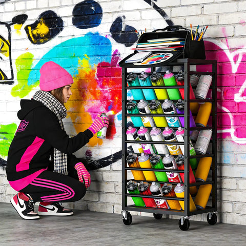 Heavy Duty Rolling Cart Holds A Solid Fifty Spray Paint Cans Built Tough For Double Sided Storage Plus Top Tool Tray with artist using spray paint.