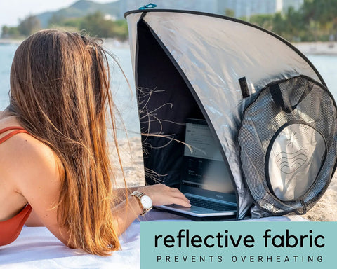 Outdoor Laptop Sun Shade For Working Anywhere Glare Blocker And Heat Reflective Hood on beach with laptop inside