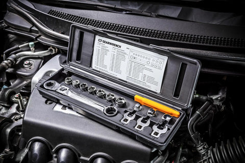 Serpentine Belt Tool Set 15 Pc With Locking Flex Head Ratcheting Wrench on car engine, open case displaying 15 pc kit.