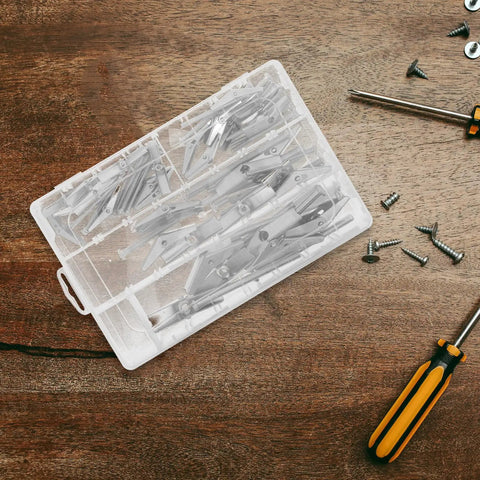 32 Piece Stainless Steel Toggle Bolts And Drywall Anchors Kit with wing nuts on a wooden surface next to screws and screwdriver