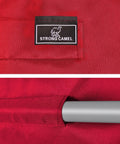 Brand label and corner pocket detail of Patio Swing Canopy Replacement Top Cover For 77 By 43 Inch Porch Furniture Burgundy UV Blocking Water Repellent With Velcro Tabs And Four Corner Pockets No Fuss Install.