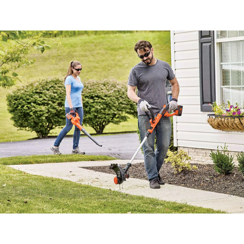 Man using 40V Max Cordless Sweeper And String Trimmer All In One With Battery And Charger Included No Wires No Fuss Convenience Auto Feed Spool Power Drive High Torque For Fast Clean Cuts Low Noise Run Up To 130 MPH Debris Clearing on sidewalk
