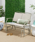 Two Person Outdoor Patio Swing Glider With Smooth Rocking Motion, Textilene Fabric Over Powder Coated Steel Frame in garden setting.