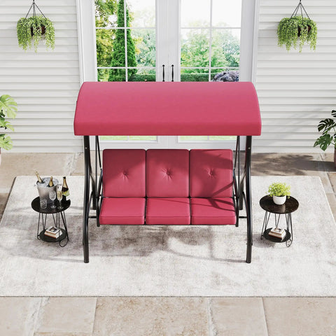 Red three seat outdoor porch swing with stand and cushioned seats under a canopy, shown on a patio setting.
