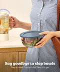 Five In One Food Prep And Storage Bowl System With Crinkle Slicing Shredding Functions dual bowl held by a woman.
