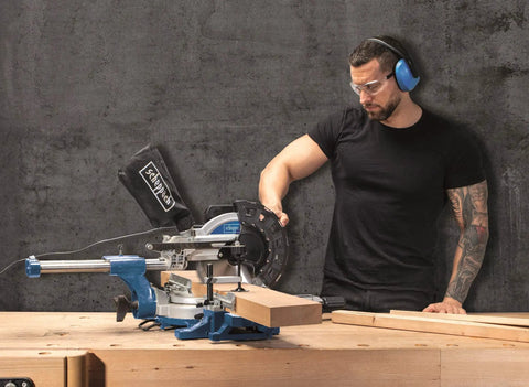 Heavy Duty Workhorse Circular Saw Featuring Knockout 2000 Watt Power Output And Slick Smooth Cutting Action For Toughest Job Site Rip And Crosscut Tasks in action with a wood plank.