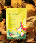 Package of Convino Kitchen Compost Deodorizer on leafy ground, labeled to treat 100 lb of waste and minimize odors.
