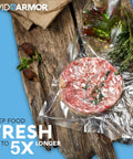 Chamber Vacuum Sealer Pouches Set Pro Grade 3.5 Mil Heavy Duty BPA Free Bags with frozen meat on wooden board