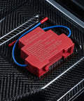Hella Reliable Automatic Fire Extinguishing Device With Dual Nozzles For Electrical Panels And Control Cabinets Using Heat Triggered Thermal Release Suppression System Pack Of Two on a carbon fiber background.