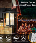 Black Exterior Wall Light With Dusk To Dawn Sensor And Seeded Glass For Front Porch Patio Or Garden, 1 Light Outdoor Fixture shown lit above a family gathering.
