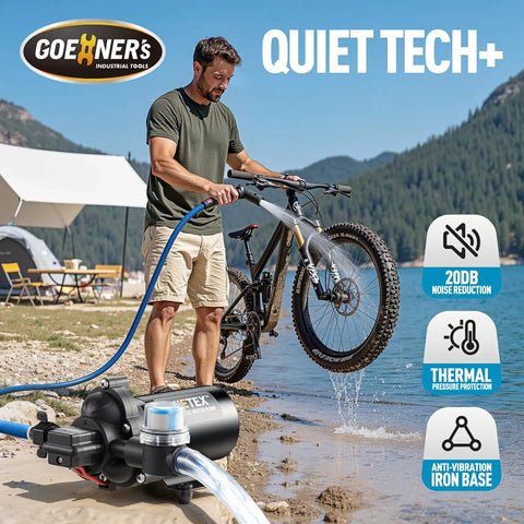 Man using Zero Hassle 12V RV Water Pump With Smart Pressure Switch to wash bike by lake outdoors.