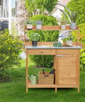 Outdoor Garden Potting Bench With Wood Tabletop And Open Shelf Cabinet Drawer Dope Fir Wood Workstation in garden setting