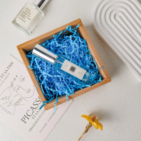 Top Shelf White Crinkle Paper Shreds And Gift Basket Filler No Brainer Cushioning Material For Shipping Boxes And Crafts in blue.