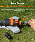 Turbo Oscillating Water Sprinkler With 17 Nozzles and quick connect hose in use on grass showing anti-accidental disconnect lock.