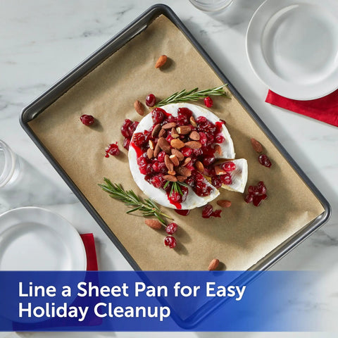 No Sweat Baking Unbleached Parchment Paper 45 Square Feet Roll lining a sheet pan with cheese and toppings for easy holiday cleanup.