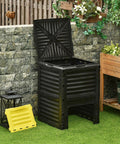 Massive 80 Gallon Outdoor Compost Bin With Aerating Design And 48 Air Vents shown in garden setting next to wall with lid open
