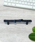 Six Piece Tree Branch Cabinet Handles Set In Black Twig Style Drawer Pulls with keyboard backdrop