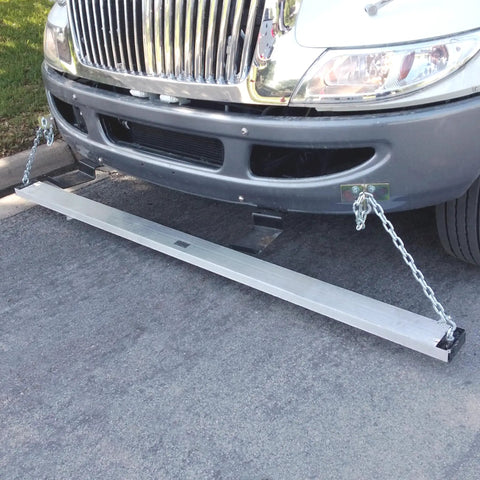 Rig Ready Magnetic Road Sweeper That Knocks Nails And Scrap Metal Out Of The Way On Job Sites Uses Simple Hang Bracket To Sweep A Bold 72 Inch Track Daily Saves Your Tires And Keeps Pavement Pristine attached to the front of a truck.