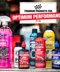 Various bike maintenance products including lubricants and cleaners, featuring Pro Grade Bicycle Chain Cleaner Tool For Road Mountain Gravel And E Bikes Fast 60 Second Chain Cleaning System Durable Reusable And Easy To Use Bike Maintenance.