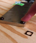 Finger showing Dia Sharp Diamond Knife Sharpener Bench Stone's non-slip base detail on wooden surface