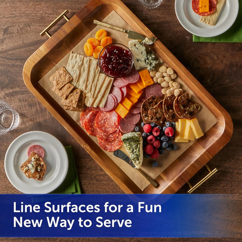 No Sweat Baking Unbleached Parchment Paper 45 Square Feet Roll under a charcuterie platter for easy cleanup.