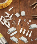 Spring Loaded Plantation Shutter Pins And Heavy Duty Magnets Complete 125 Piece Repair Kit With Screws For Windows Doors laid out on wooden surface.