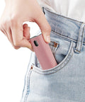 Touchscreen Mist Cleaner Kit With Spray And Wipe Pink Pocket Size Screen Cleaner shown being placed in jeans pocket.