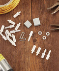 Top Notch Plantation Shutter Repair Kit 170 Piece Assortment Of Spring Pins Collar Brass Louver Staples For Quick Window Blind Fixup And No Sweat Home Refresh with assorted white pins and staples.