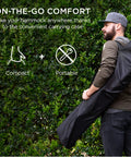 Man carrying Two Person Outdoor Hammock With Spreader Bars And Cotton Rope, Backyard Patio Lounger in a case, 450 Pound Weight Capacity