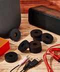 Killer 4 Pc Thick Rubber Isolation Pads And Vibration Damping Washers 1 5 Inch Od on wooden surface with audio equipment.