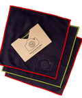 Microfiber cleaning cloths by Amazon, extra-large 8-pack, navy with red and green edges for cameras and screens.