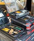 Four Compartment ABS Tool Tray For Milwaukee Packout Compatible Half Width Boxes with tools and hardware in garage setting