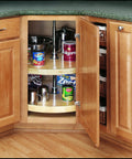 Premium Wood Lazy Susan Double Tier Turntable For Corner Base Cabinets showing maple shelves and storage items in a kitchen cabinet.