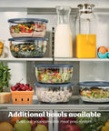 Five In One Food Prep And Storage Bowl System With Crinkle Slicing Shredding Functions dual containers filled with salads in refrigerator.