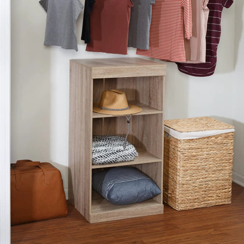 Slick Freestanding Stackable Shelf Unit With Three Adjustable Wooden Shelves And Clean Brown Finish For Nifty Home Organization Heavy Duty Storage Rack next to a hat and a woven basket.