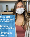 Woman wearing 125-Pack Disposable Face Masks 3-Ply Breathable Protection with Adjustable Nose Clip and Soft Earloops.